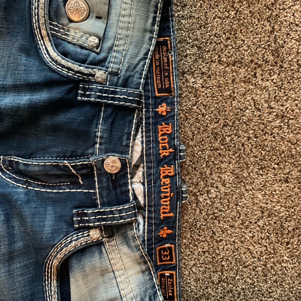 Used rock revival jeans